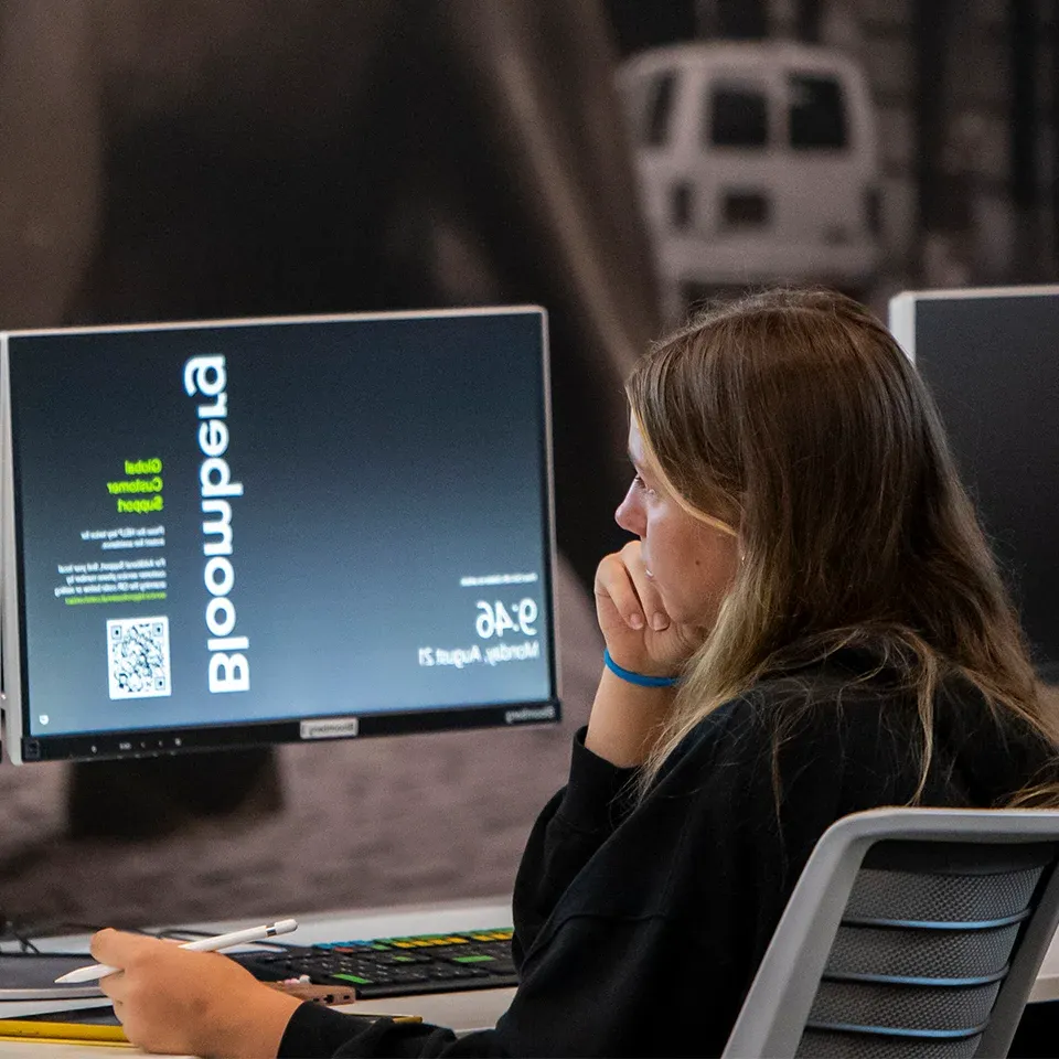 BW student in front of a computer